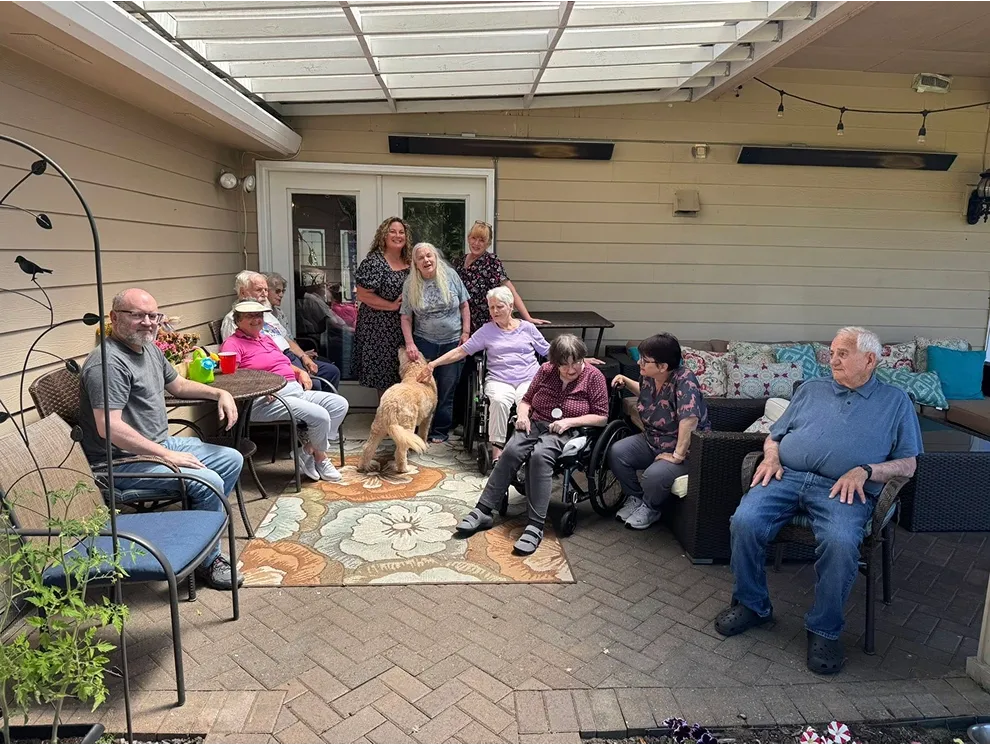 residents in senior care home in Vancouver WA in their backyeard
