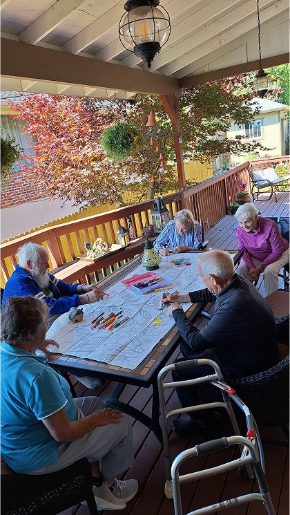 seniors in an adult family home in Vancouver WA painting