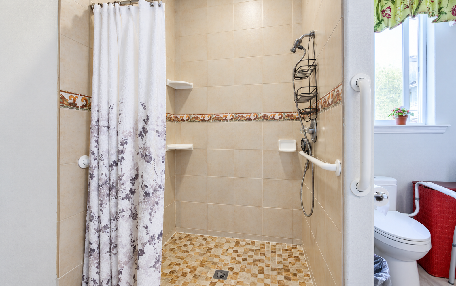 Brightened accessible bathroom with walk-in shower