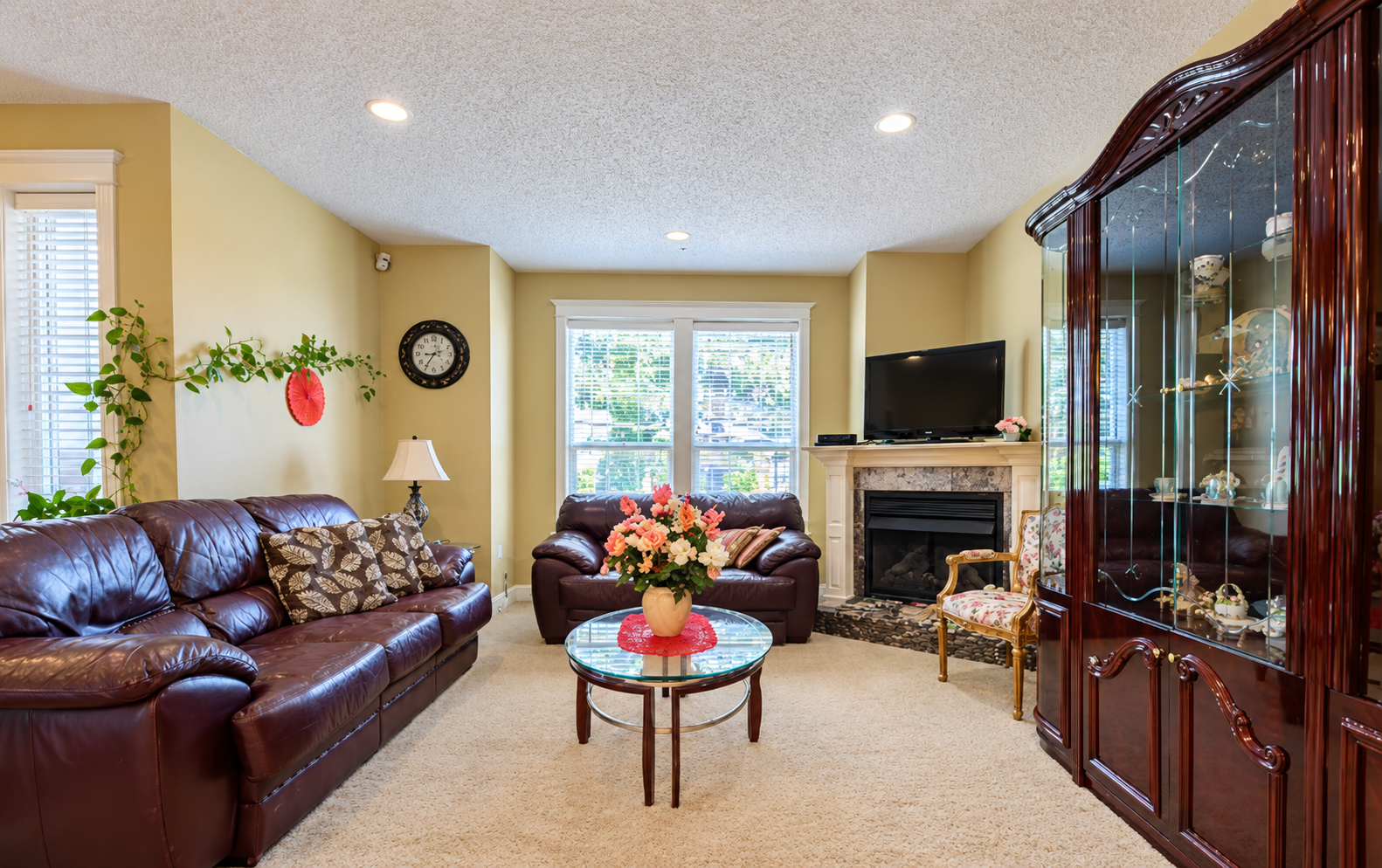 Brightened living room with fireplace