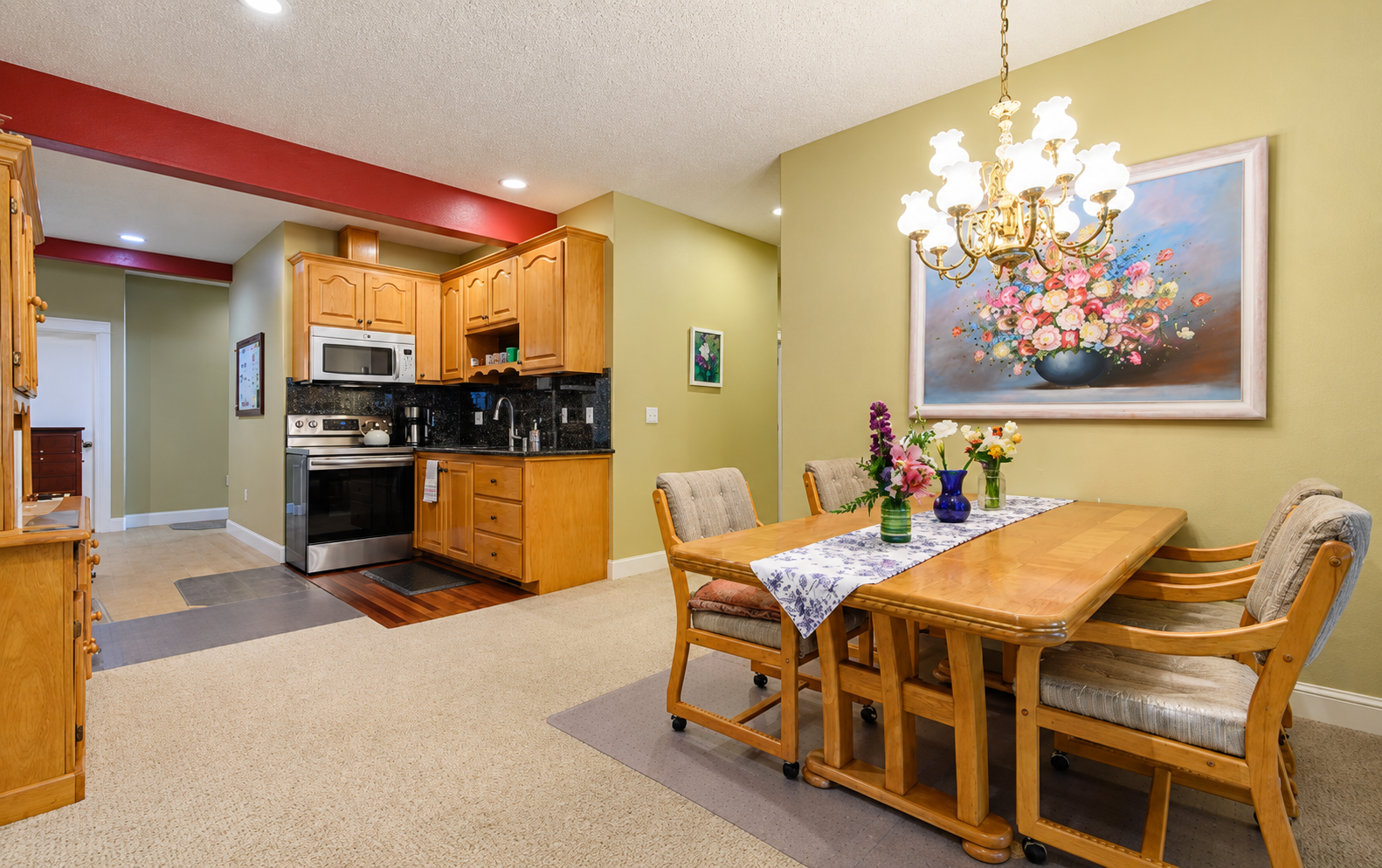 Warm, clear dining room and kitchen